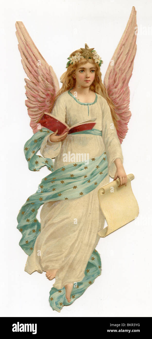 Christmas Angel Holding the Bible Stock Photo Alamy