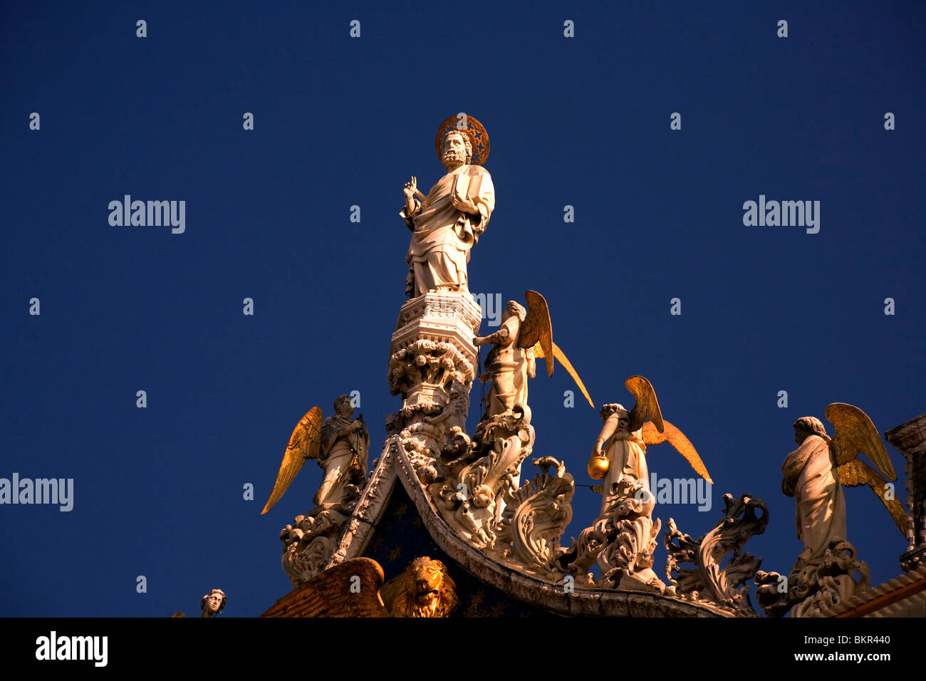 Italy, Veneto, Venice; St.Mark surrounded by archangels, on top of the Basilica di San Marco styled in Byzantine architecture. Stock Photo