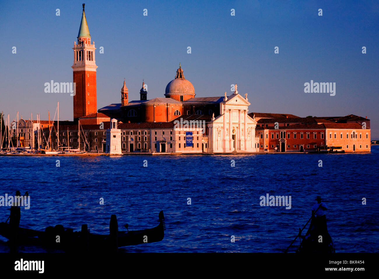 Italy, Veneto, Venice; Two godolas returning to the Bacino di San Marco with San Giorgio Maggiore majestically in the background Stock Photo