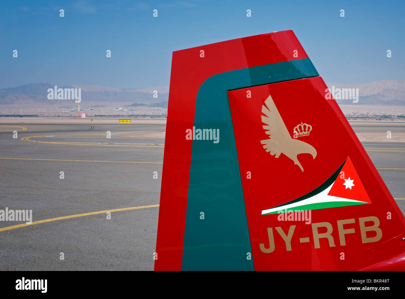 flights to king hussein international airport