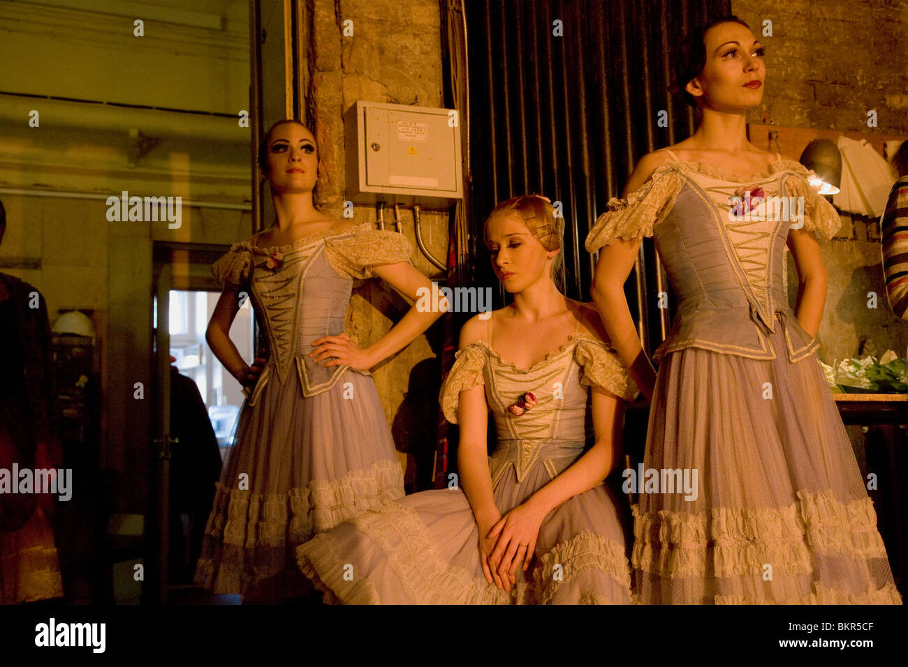 Russia, St.Petersburg; Three ballerinas in the wings, reminiscent of a Pre-Raphaelite painting, Tchaikovsky's 'Nutcracker' Stock Photo