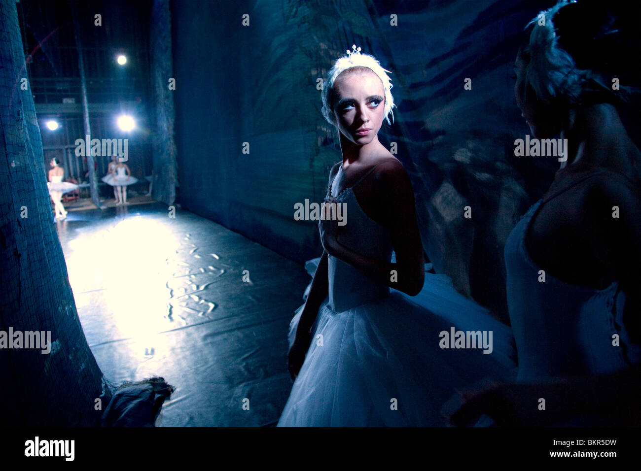 Russia, St.Petersburg; Two ballet dancers in the wings during a performance of Tchaikovsky's 'Swan Lake' Stock Photo