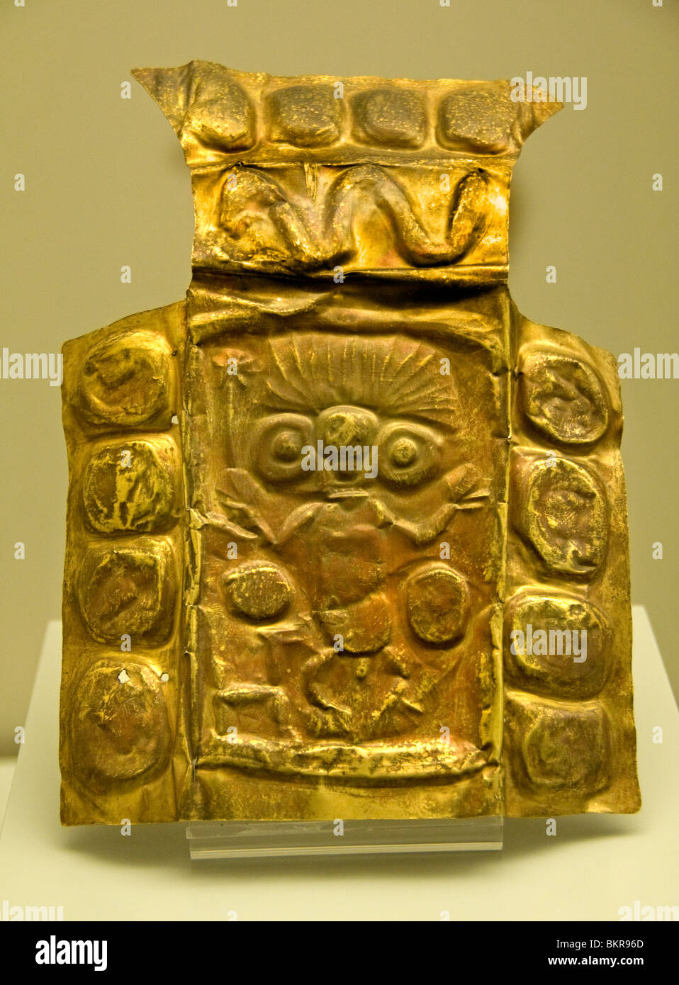 Embossed plate. Gold. Inca culture. (1400-1533 AD). Cuzco, Peru.  Peruvian embossed badge gold Stock Photo