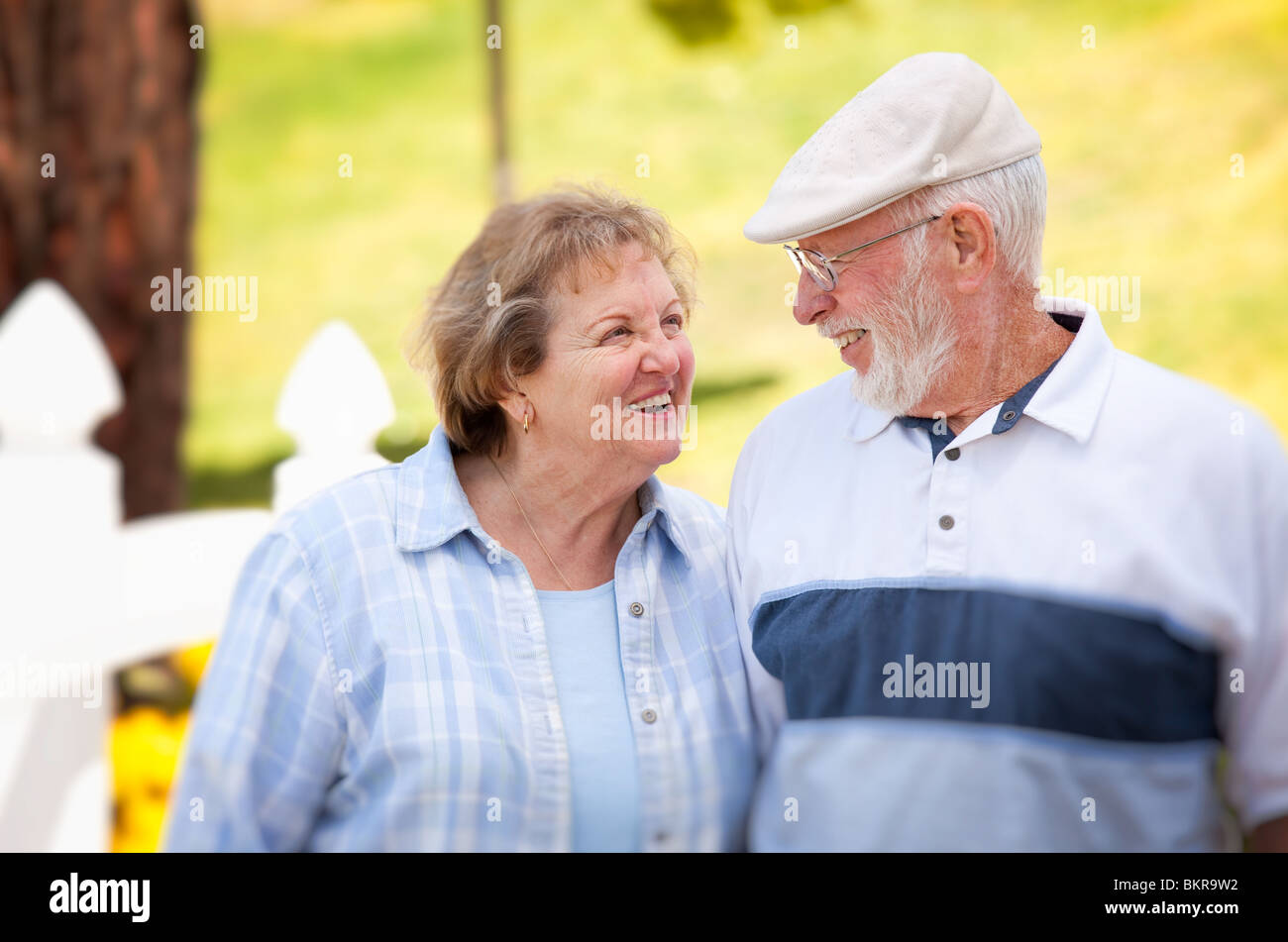 Happy Senior Couple Enjoying Each Other in The Park Stock Photo - Alamy