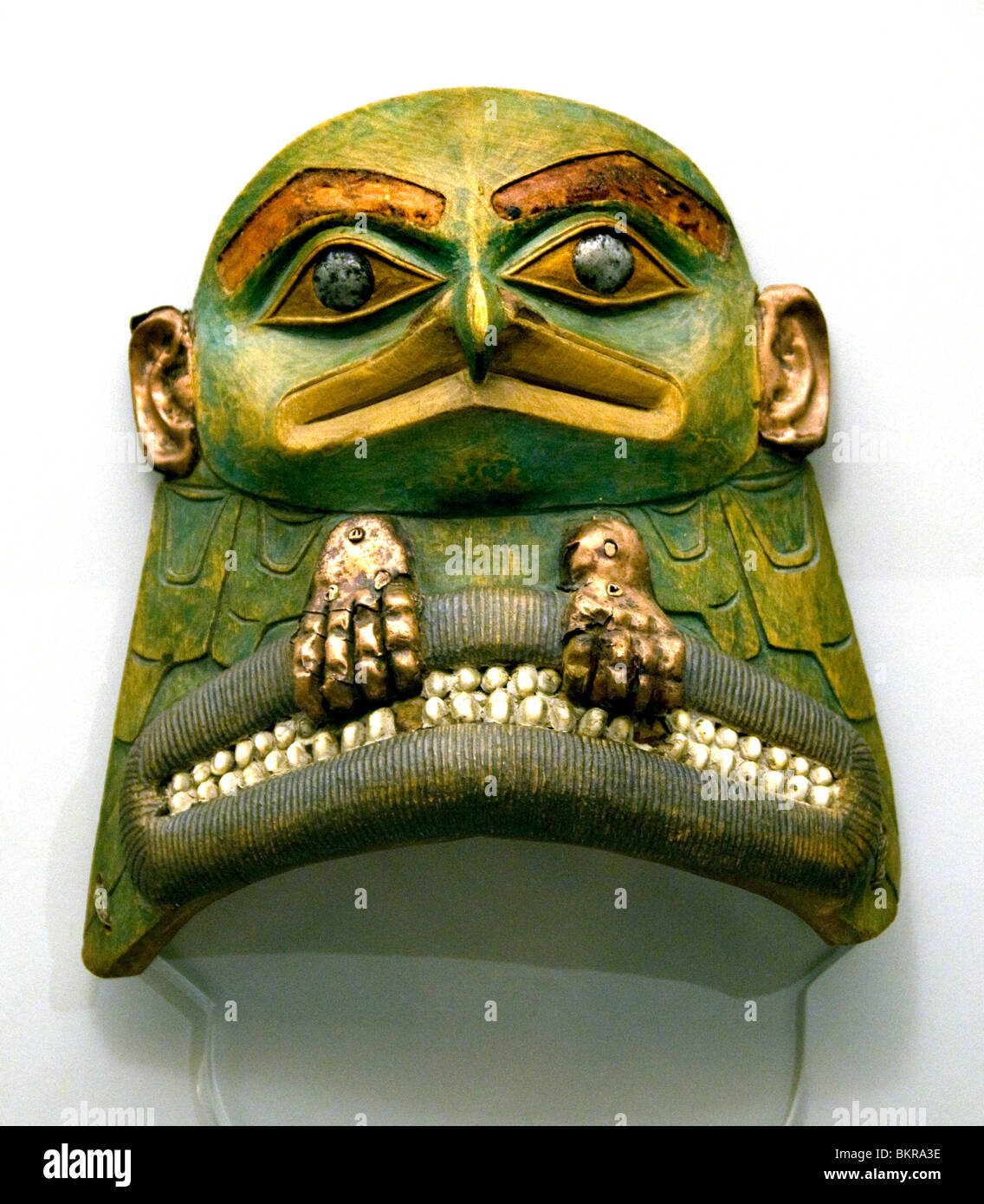 Tlingit Indians 18th Century  North America face mask with Lucida male spirit articulated by the shaman in their actions Stock Photo