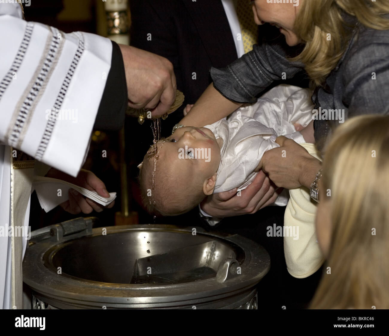 Right of baptism in a Polish American Catholic Church in Brooklyn, New York. Stock Photo