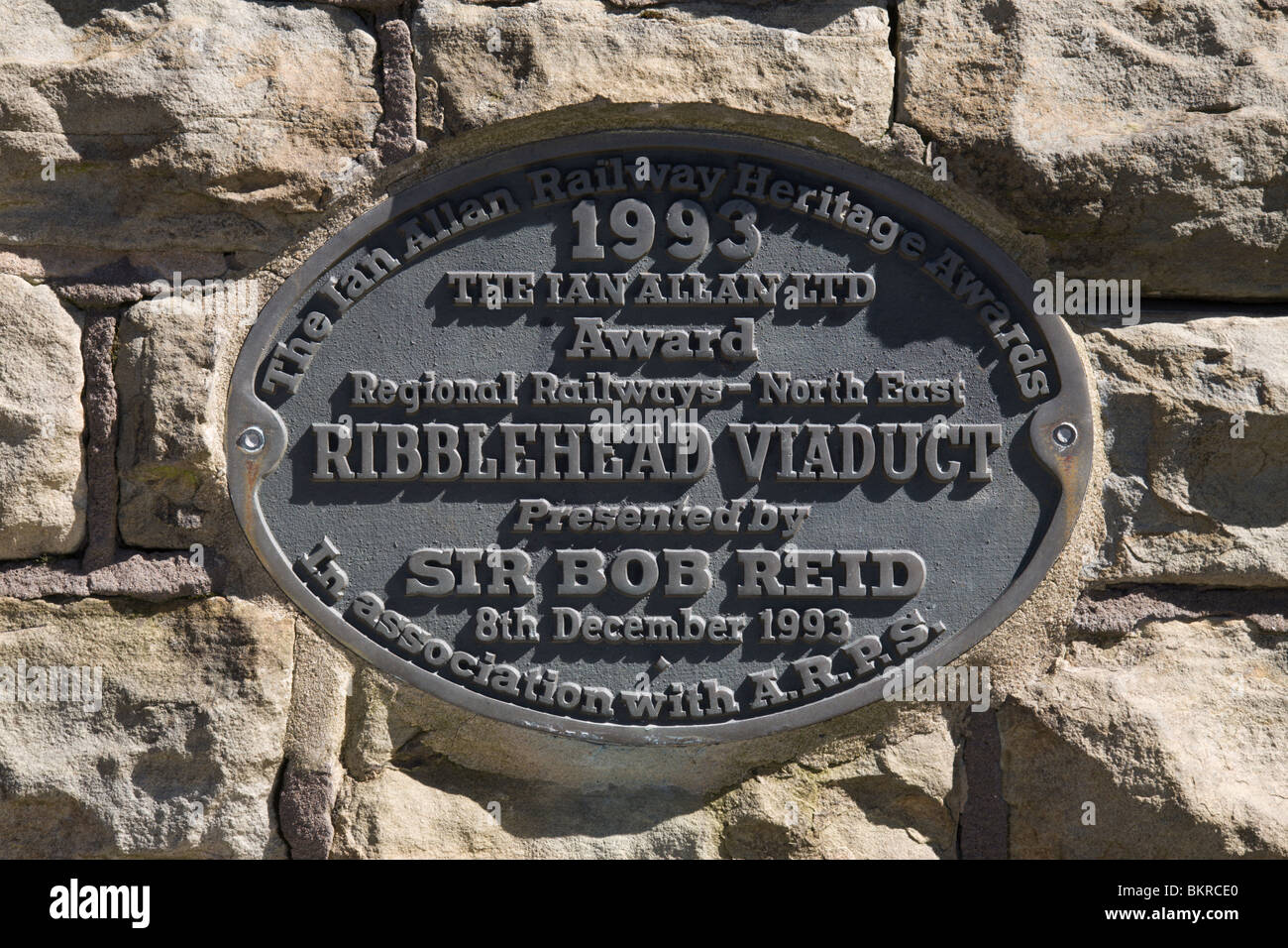 A plaque on the Ribblehead Viaduct Monument, Yorkshire Dales, England. Stock Photo