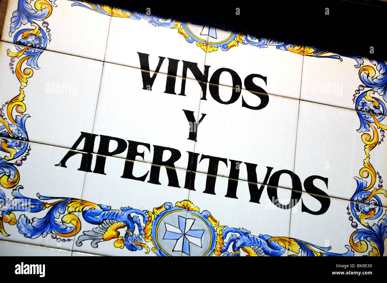 Madrid, Spain. Painted tiled restaurant sign. "Vinos y aperativos