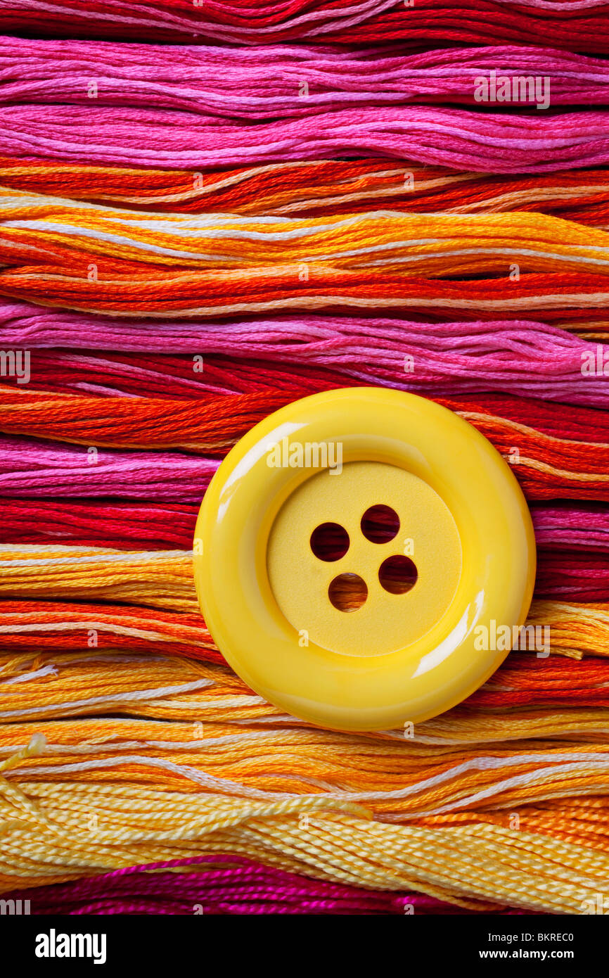 Big yellow button thread string hi-res stock photography and images - Alamy