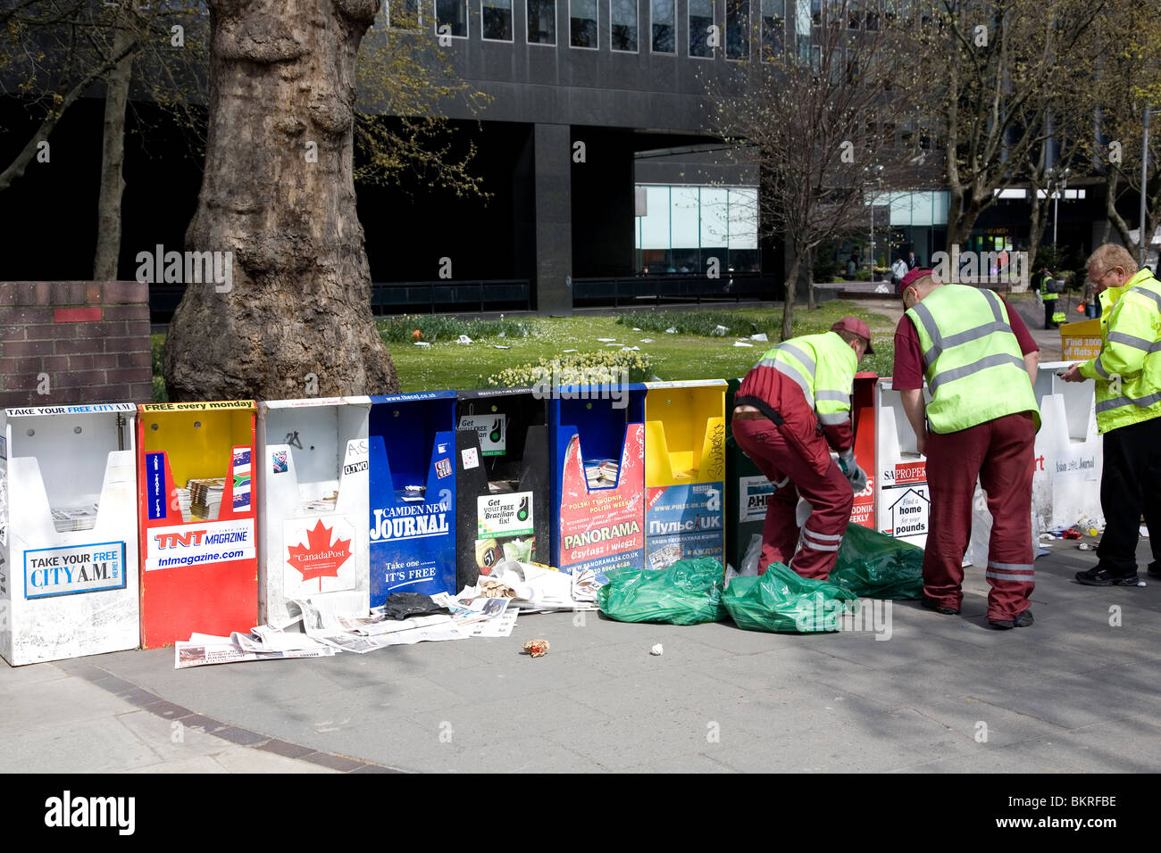 Cleaning up Free newspaper mess Stock Photo Alamy
