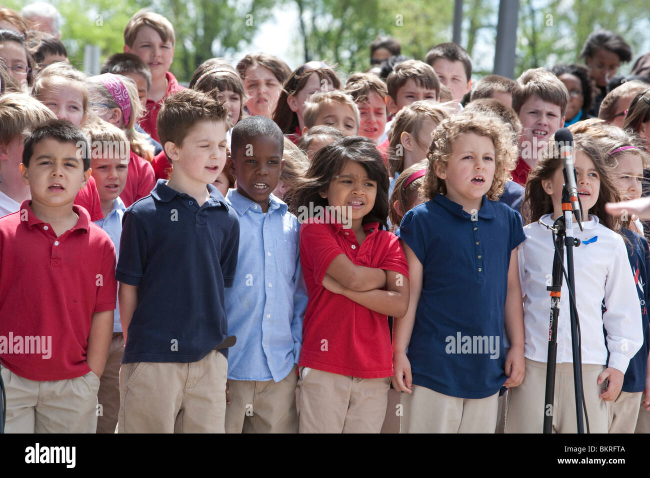 Warren, Michigan - Children from Warren Woods Christian School sing during a National Day of Prayer observance at City Hall. Stock Photo