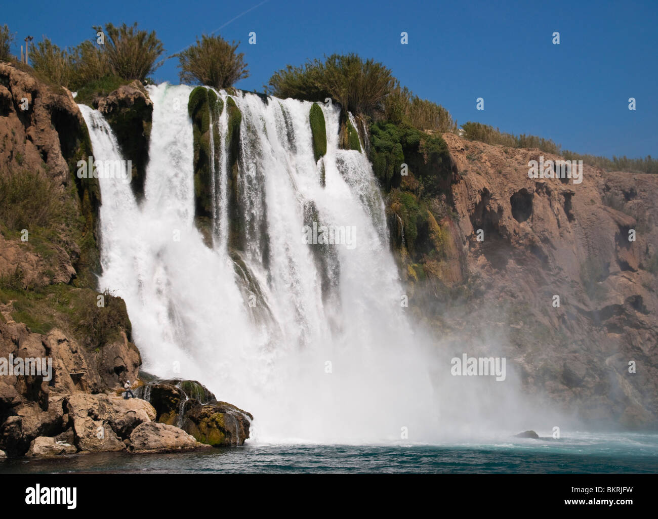 Düden lower waterfalls cascade in the sea at Antalya seen from boat trip Stock Photo