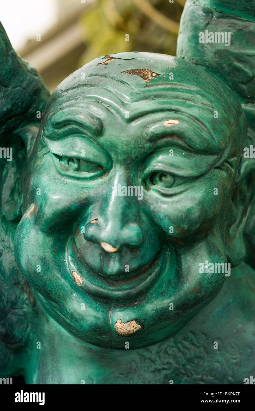 Statue of Pu-tai, The Laughing Buddha, Zen monk, Wandering Monk, happiness, good luck, plentitude Stock Photo