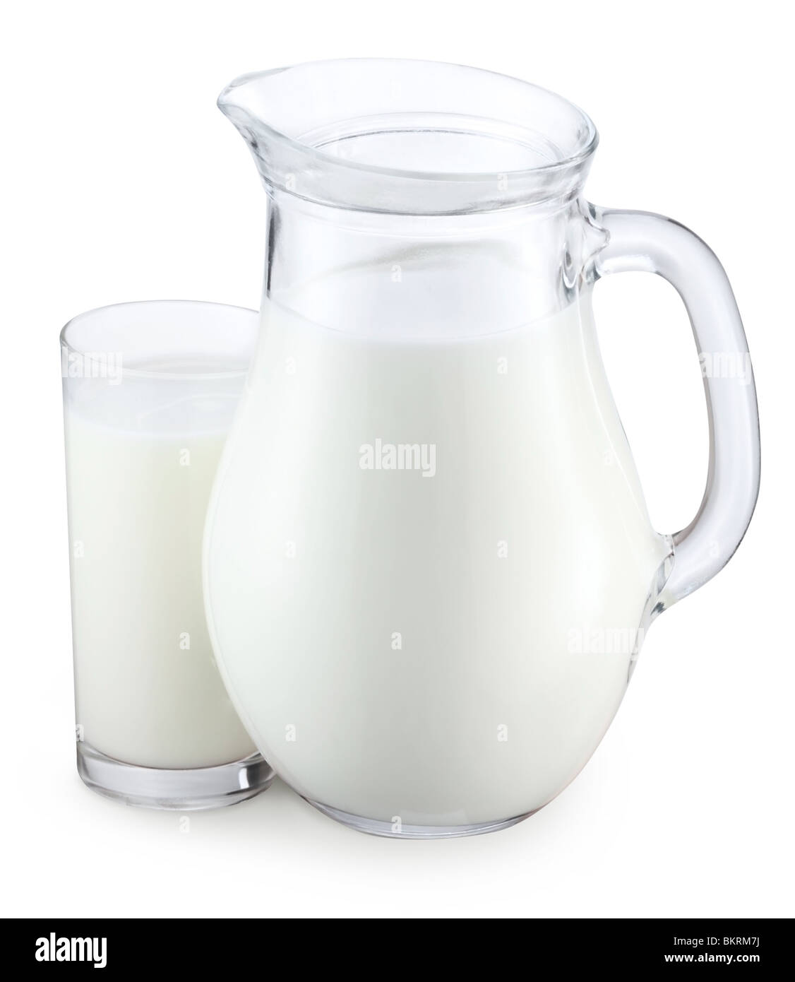 Pitcher and glass of milk on a white background Stock Photo