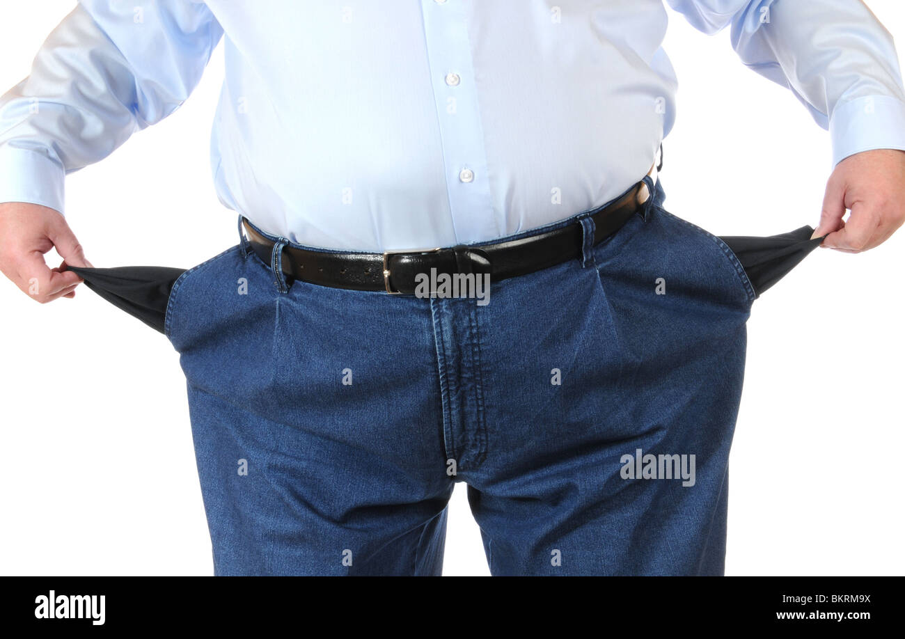 Poor man with empty pockets Stock Photo