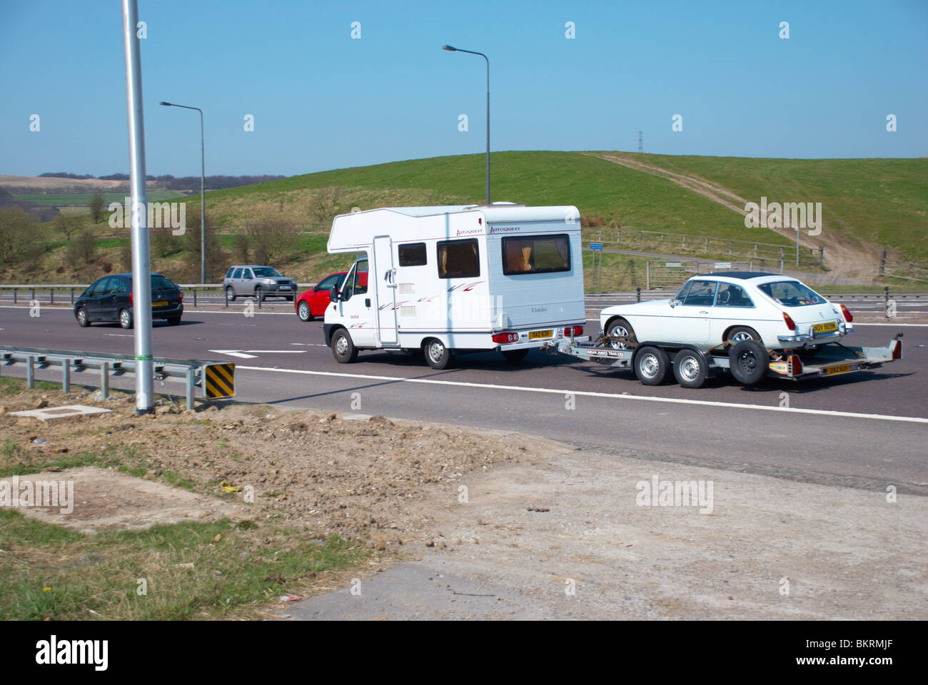 Camper van towing an MG car on the M62 (between Rochdale & Huddersfield