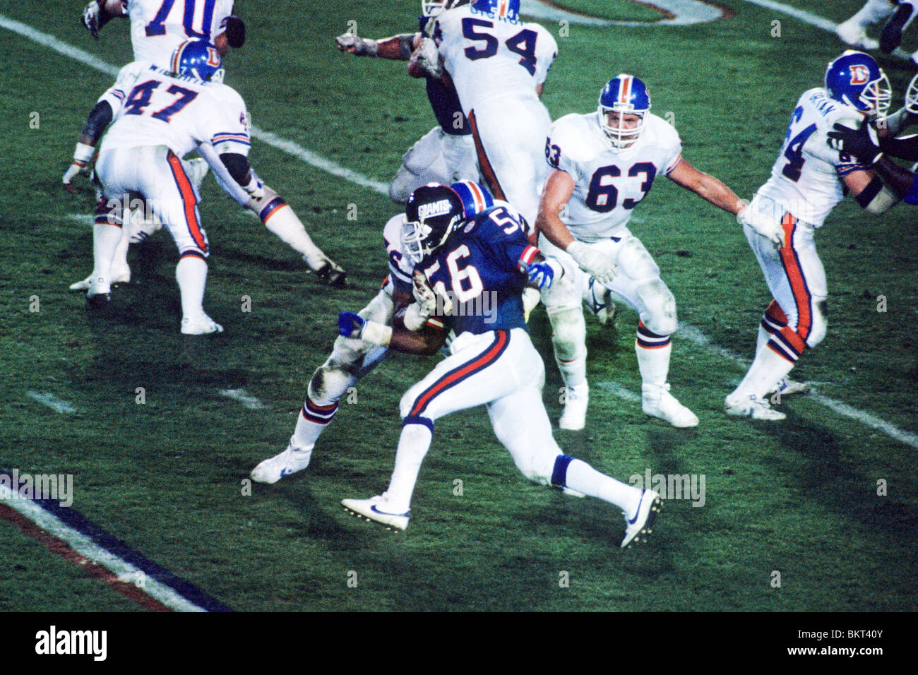 Lawrence Taylor (56), New York Giants and Luis Sharpe, St.Louis
