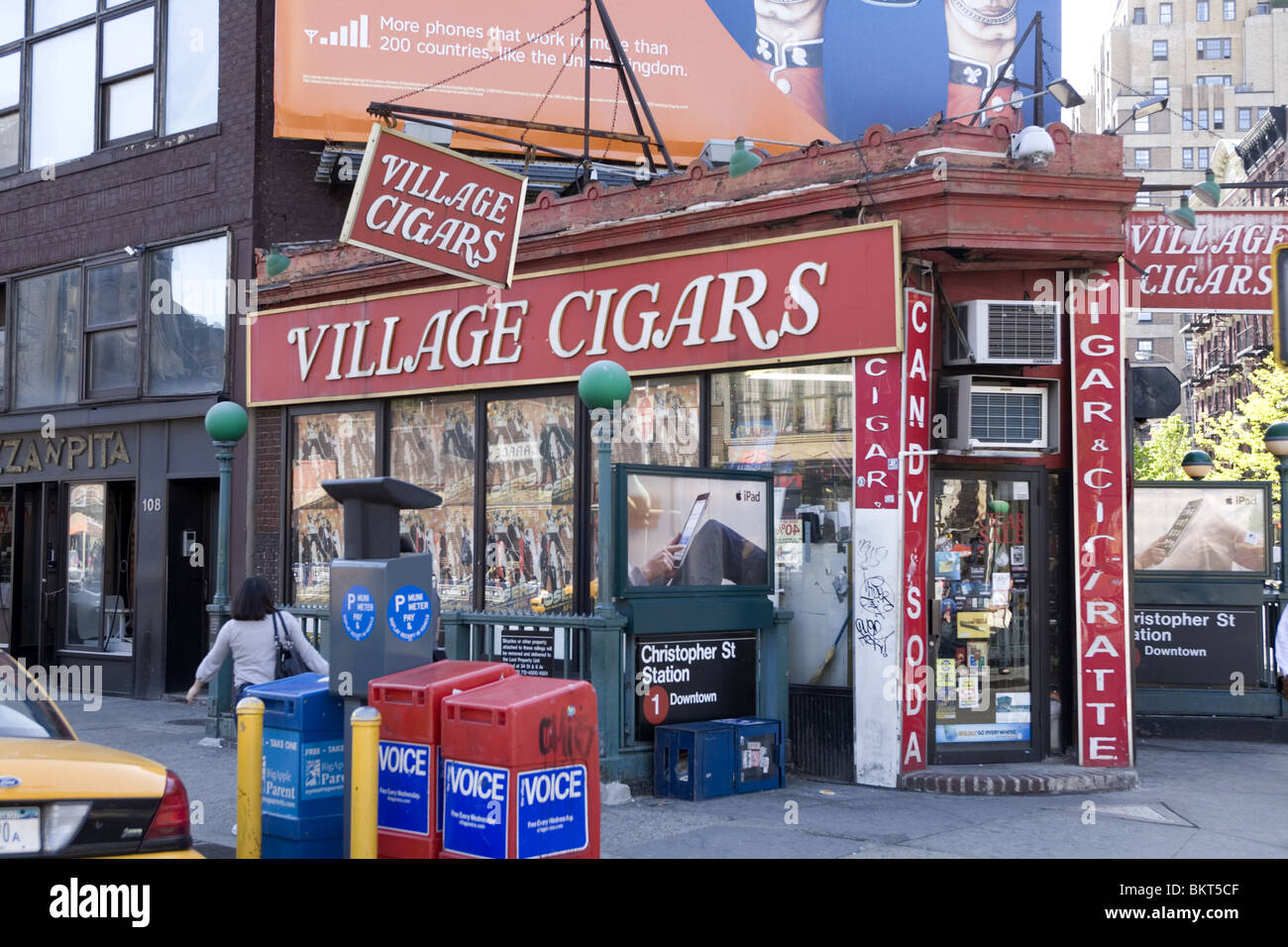 Village Cigars, a tobacco shop at the corner of 7th Ave. South and Christopher Street in Greenwich Village, NYC Stock Photo