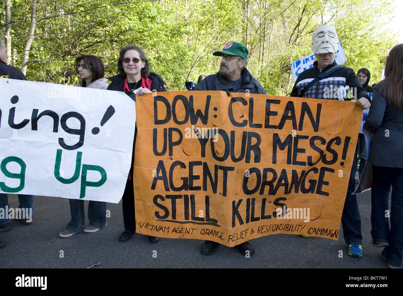 Protesters at a 'run for fresh water' event sponsored by Dow Chemical in Prospect Park, Brooklyn, NY. Stock Photo