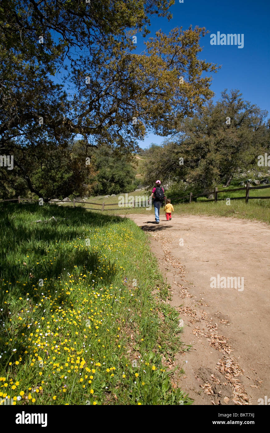 Mother and small child hiking at Santa Ysabel Open Space Preserve West, San Diego County, California Stock Photo