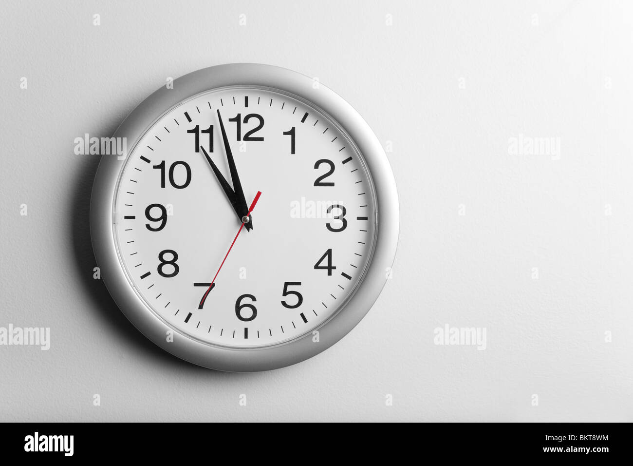 Clock on the wall Stock Photo Alamy