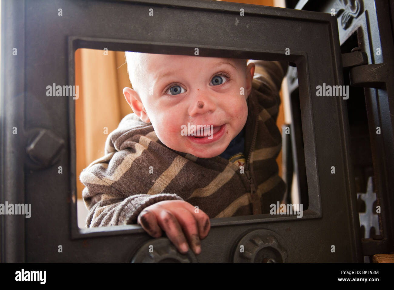 Baby Boy 1 Year Old Playing With A Wood Burning Stove Hampshire 