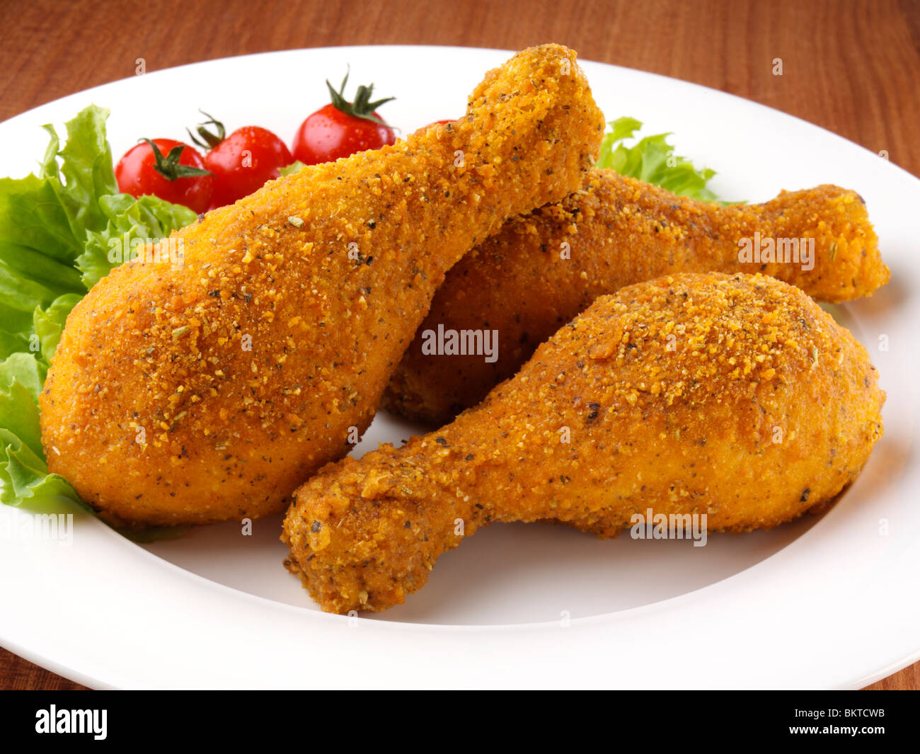 Southern style breaded chicken drumsticks Stock Photo Alamy