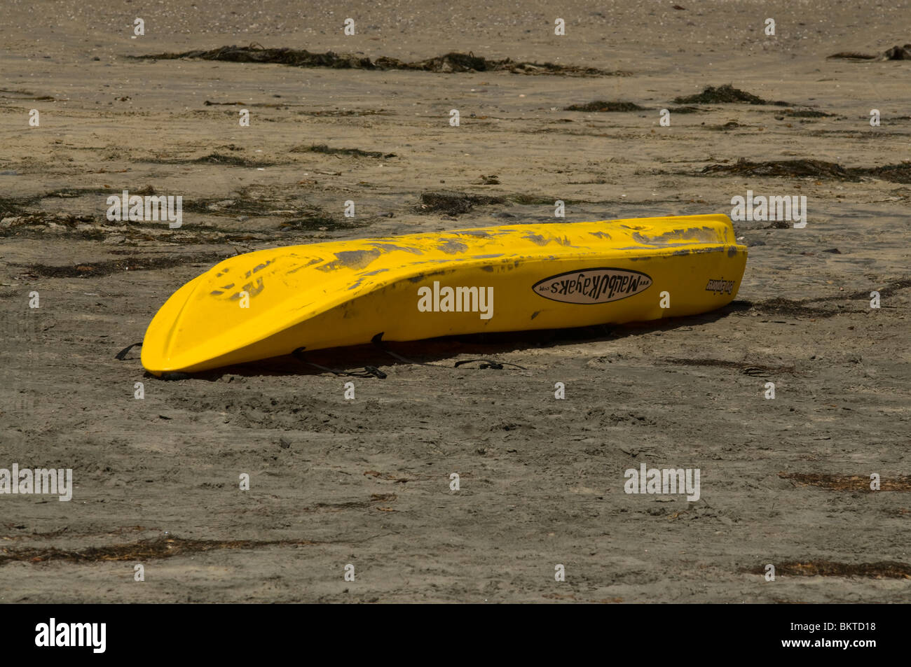 Kayak upside down on the sand Stock Photo Alamy