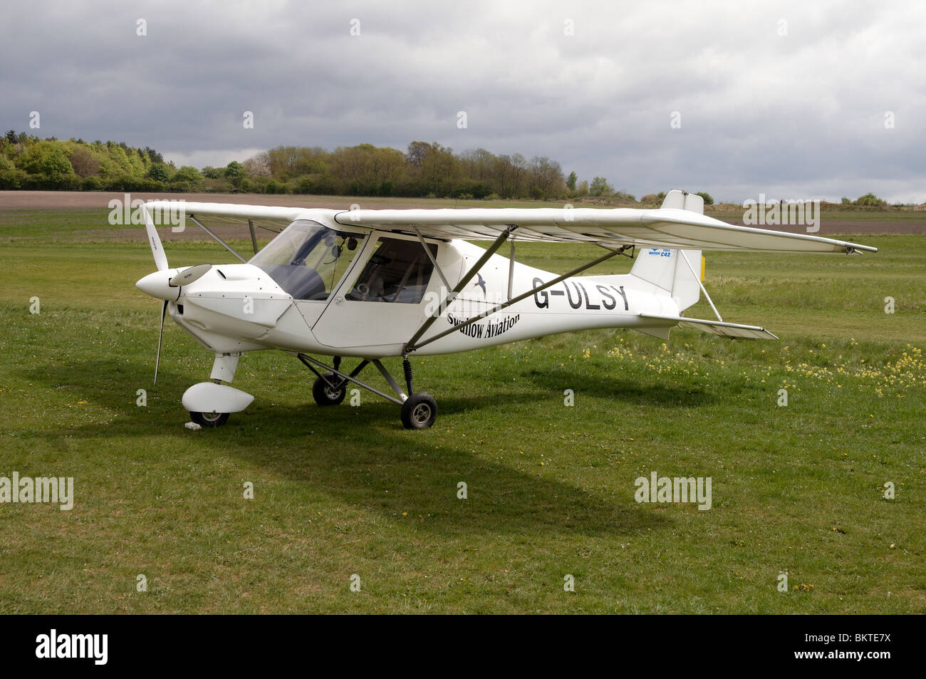 Modern microlight Ikarus C42 aircraft at Popham Airfield, Hampshire, England at a ‘Fly-In’ on Monday 3rd May 2010 Stock Photo