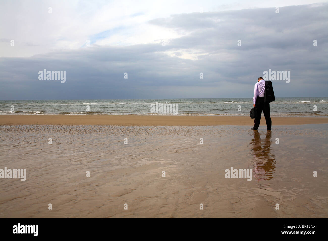 businessman on beach Stock Photo - Alamy