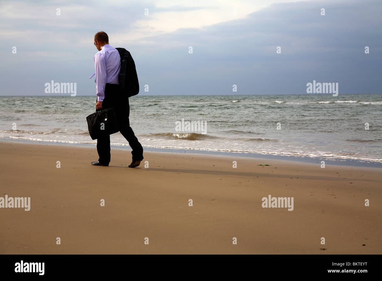 businessman on beach Stock Photo