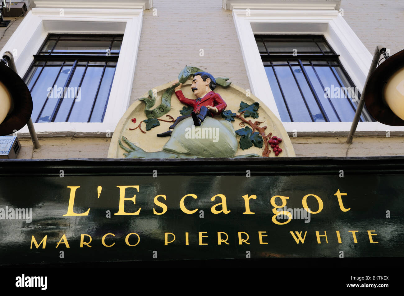 L'Escargot Marco Pierre White Restaurant sign, Greek street, Soho, London, England, UK Stock Photo