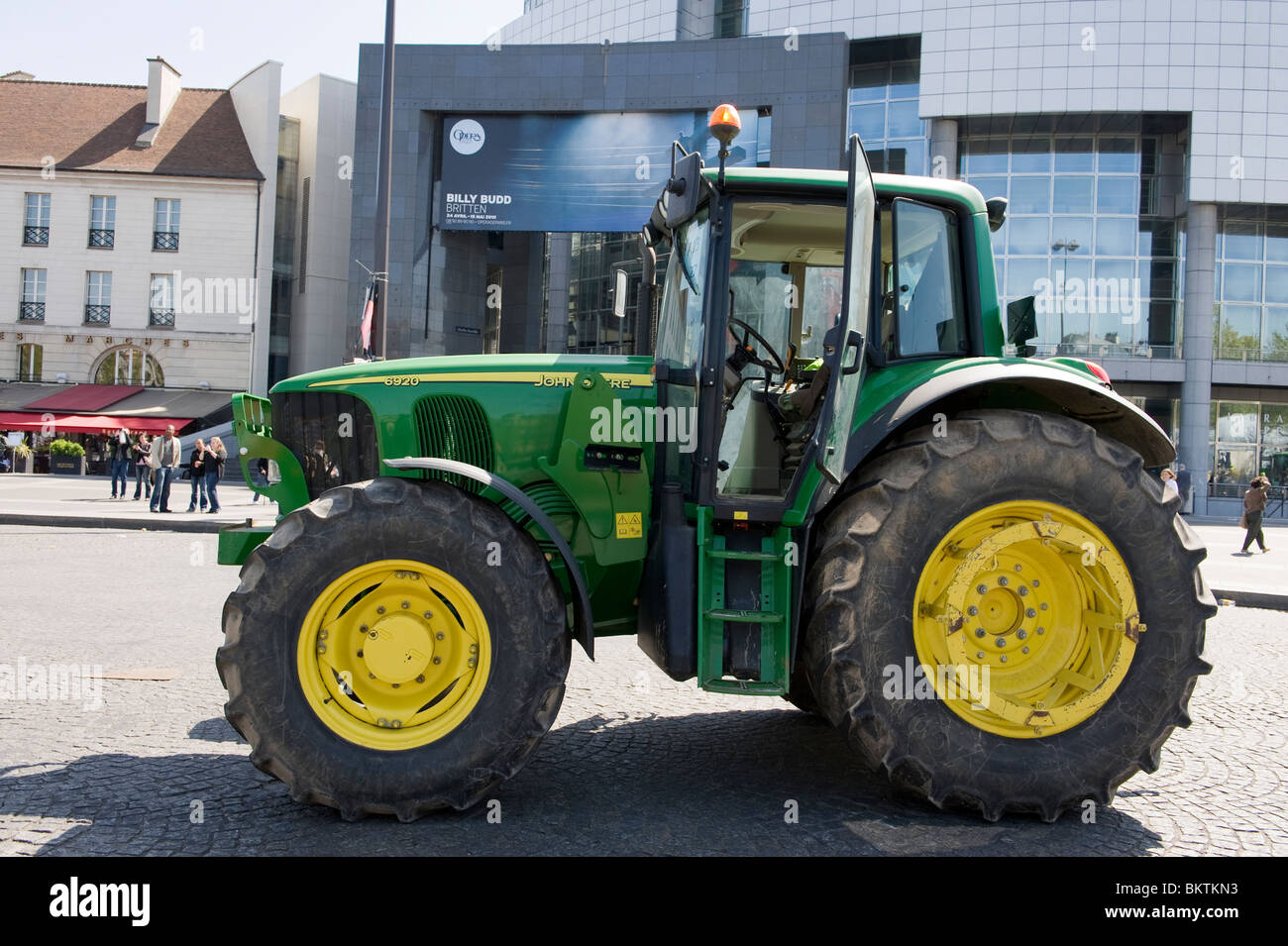 tractor standing in front of the Opera -  Bastille in Paris Stock Photo