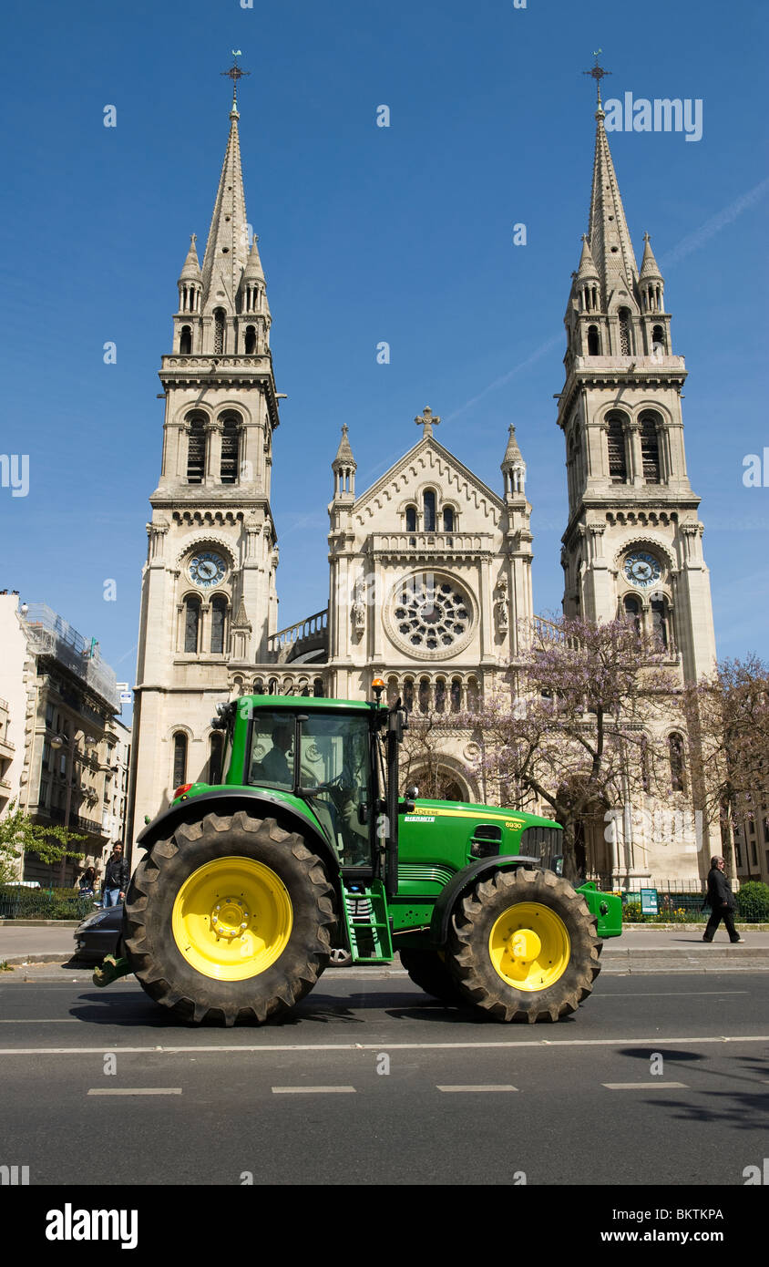tractors in the center of Paris in front of the church Saint Ambroise Stock Photo