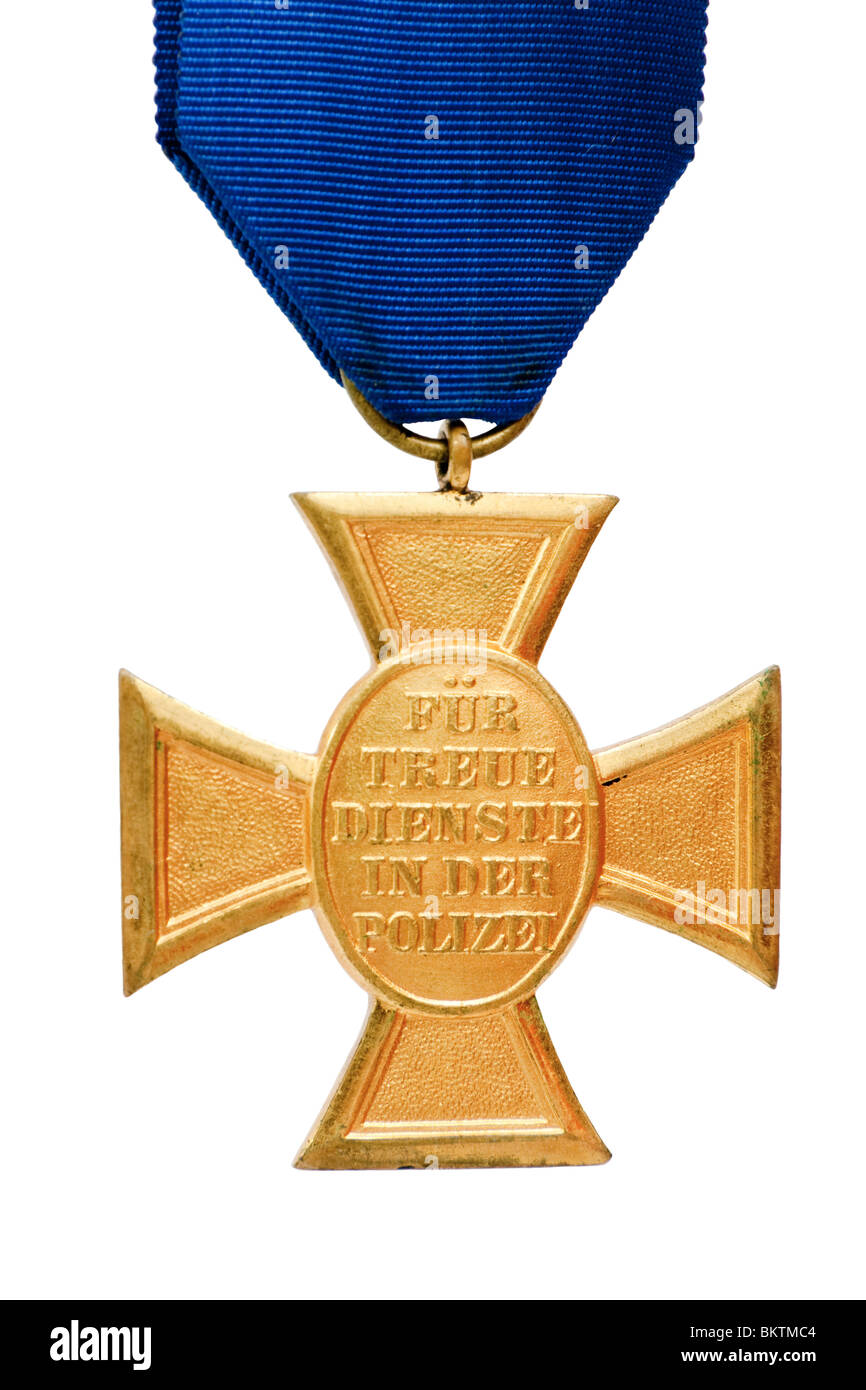 Vintage German Police 18 Year Long Service Award Medal 'Für Treue Dienste in der Polizei', isolated on white background Stock Photo