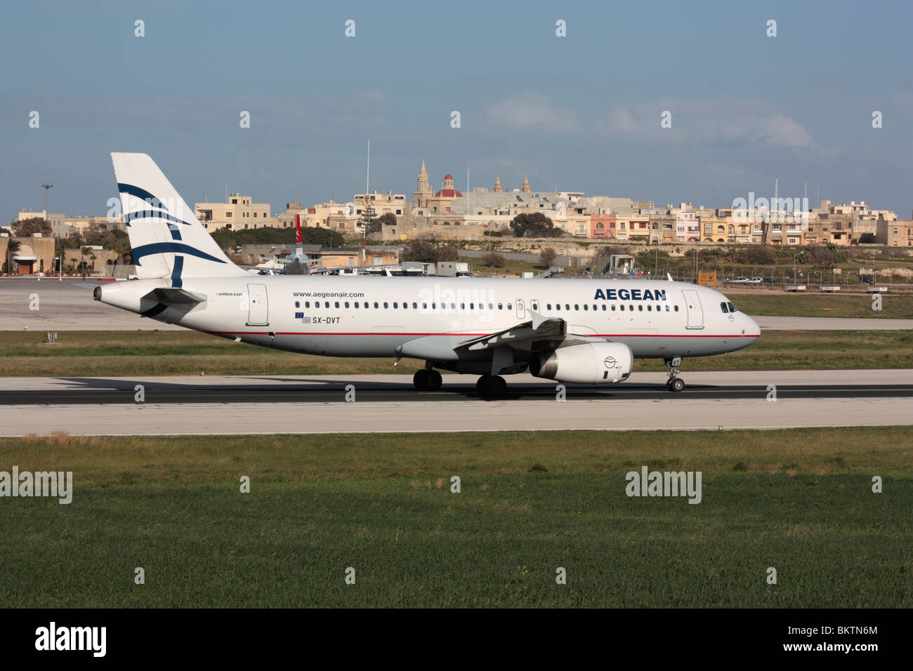 Aegean Airlines Airbus A320 passenger jet aeroplane on the runway taxiing for departure Stock Photo