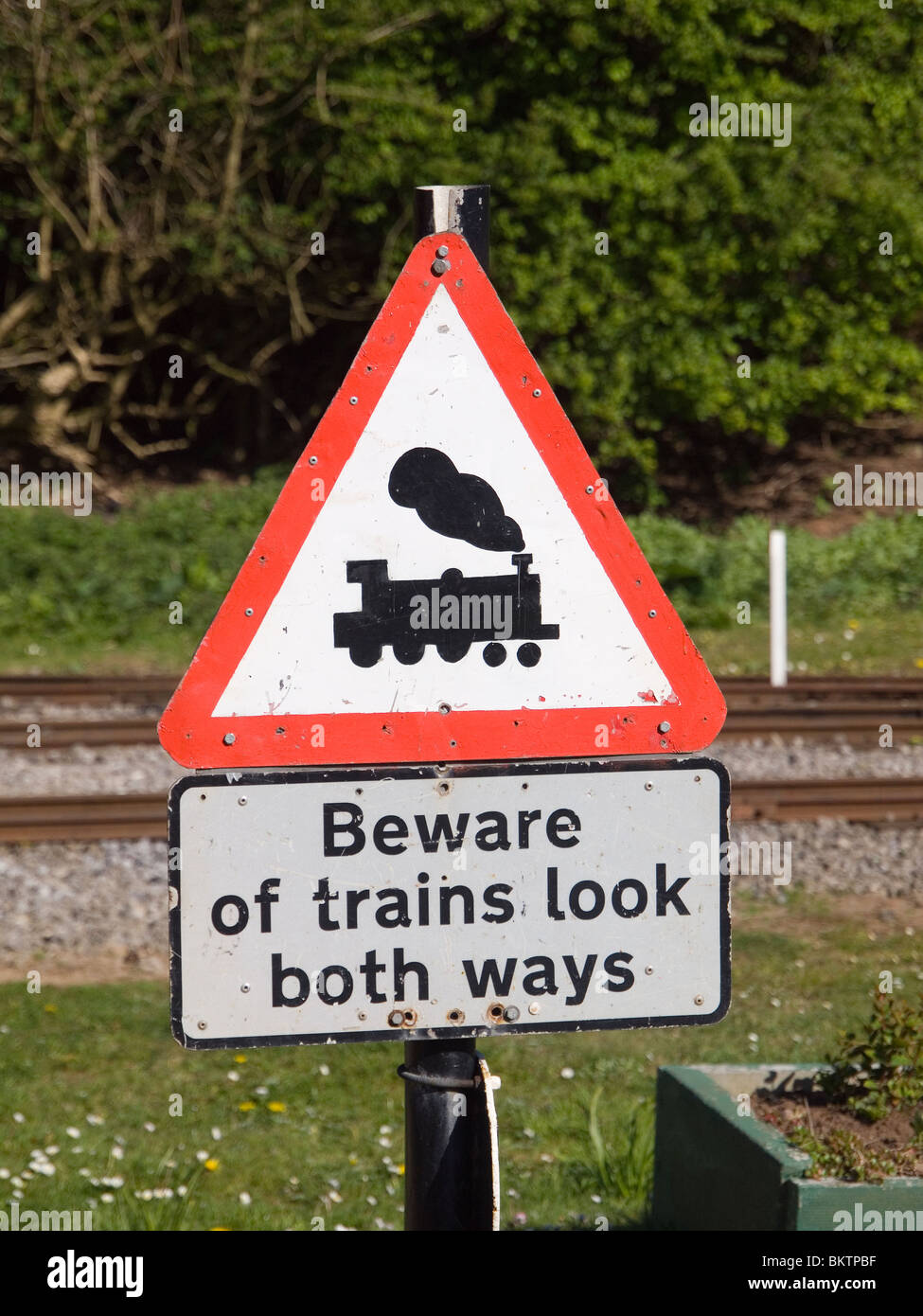 Warning notice Beware of Trains Look Both Ways on the miniature railway at Saltburn by the Sea Cleveland Stock Photo