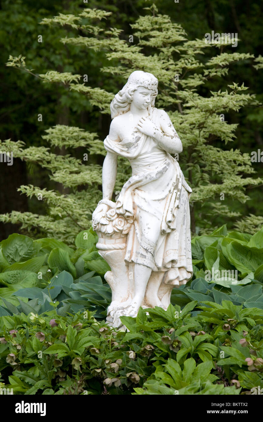 Statue of a girl in a garden (Wegerzyn Gardens in Dayton, Ohio Stock
