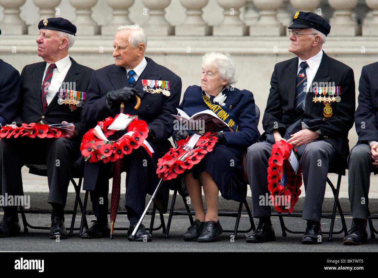 Veteran's representatives wait with wreaths before the VE Day service in Whitehall, London Stock Photo