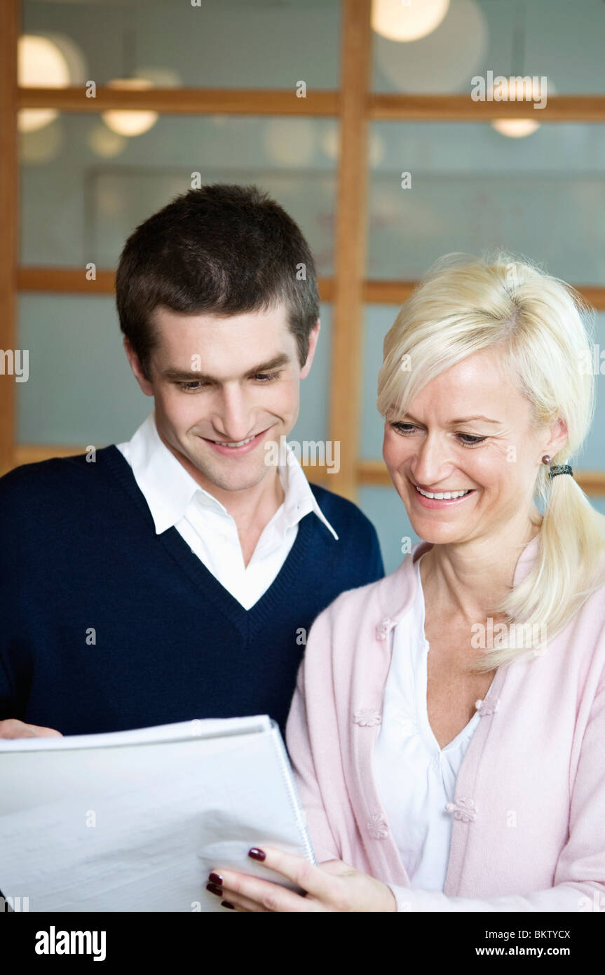 Man and woman at work Stock Photo - Alamy