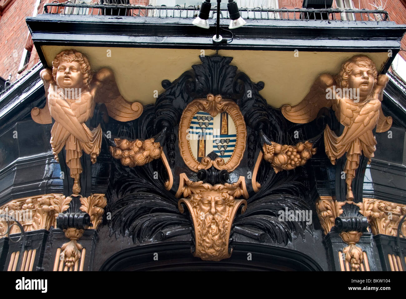 Ornate painted moulding over the entrance to the Salisbury pub, St