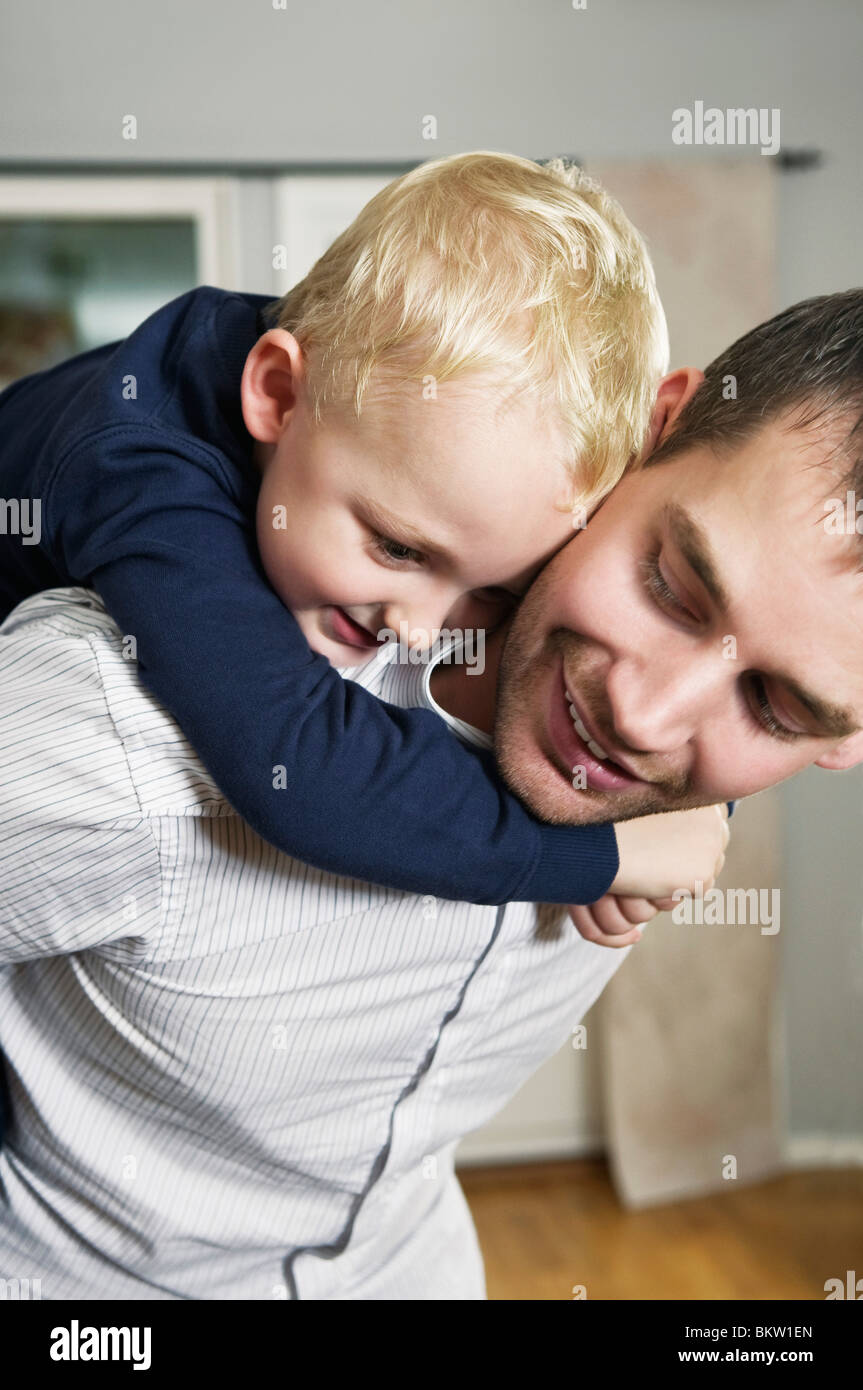 Boy and dad playing Stock Photo