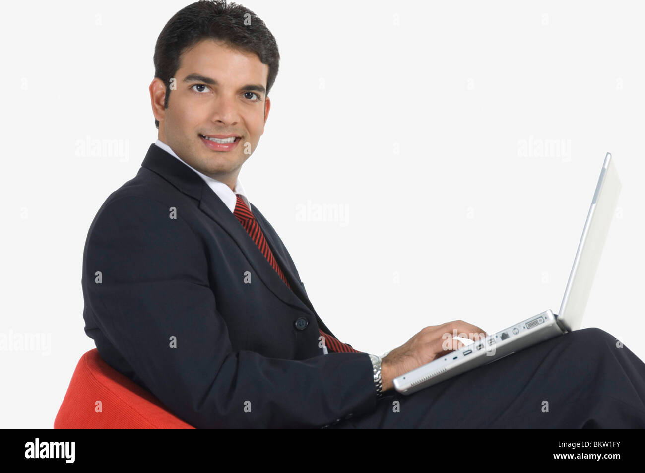 Indian man with laptop hi-res stock photography and images - Alamy