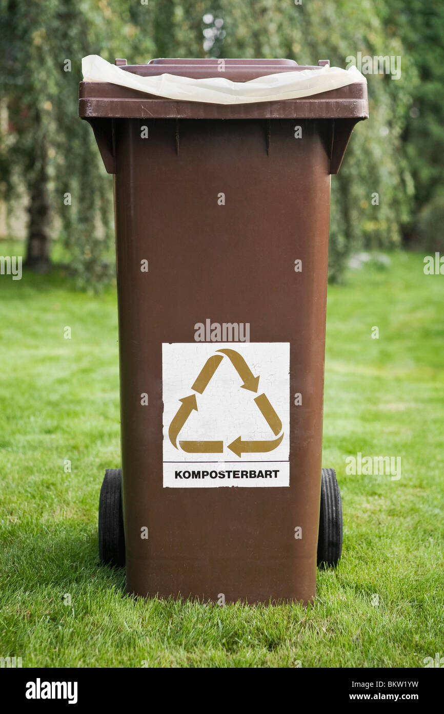 Brown trash can Stock Photo Alamy