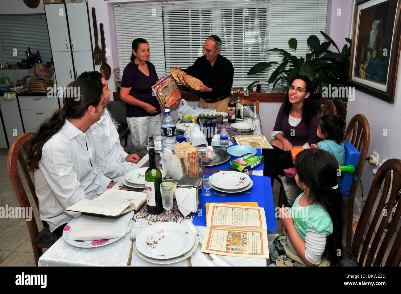 Family around the table for the traditional passover dinner, Stock Photo