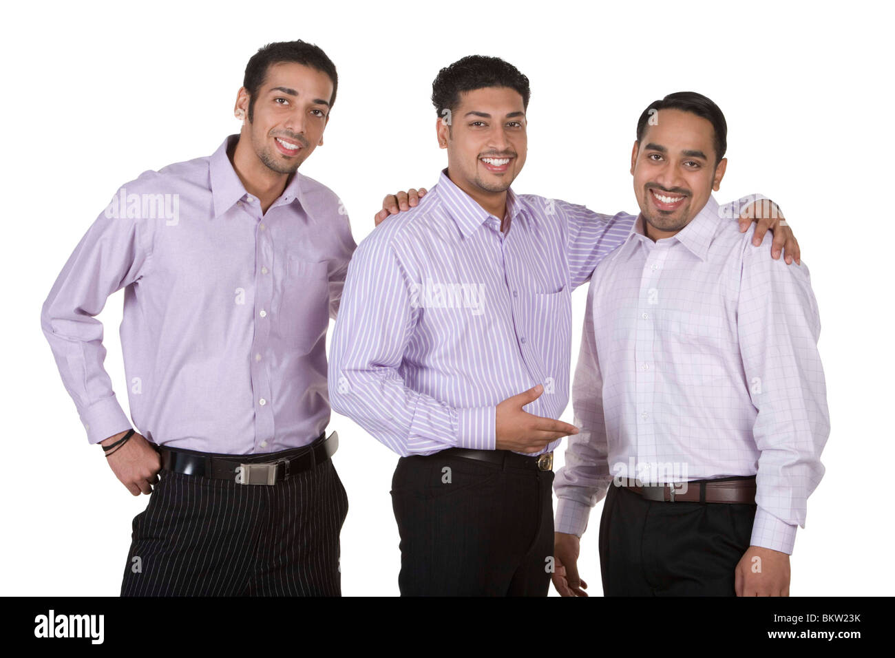 Businessmen standing side by side, smiling, portrait Stock Photo - Alamy