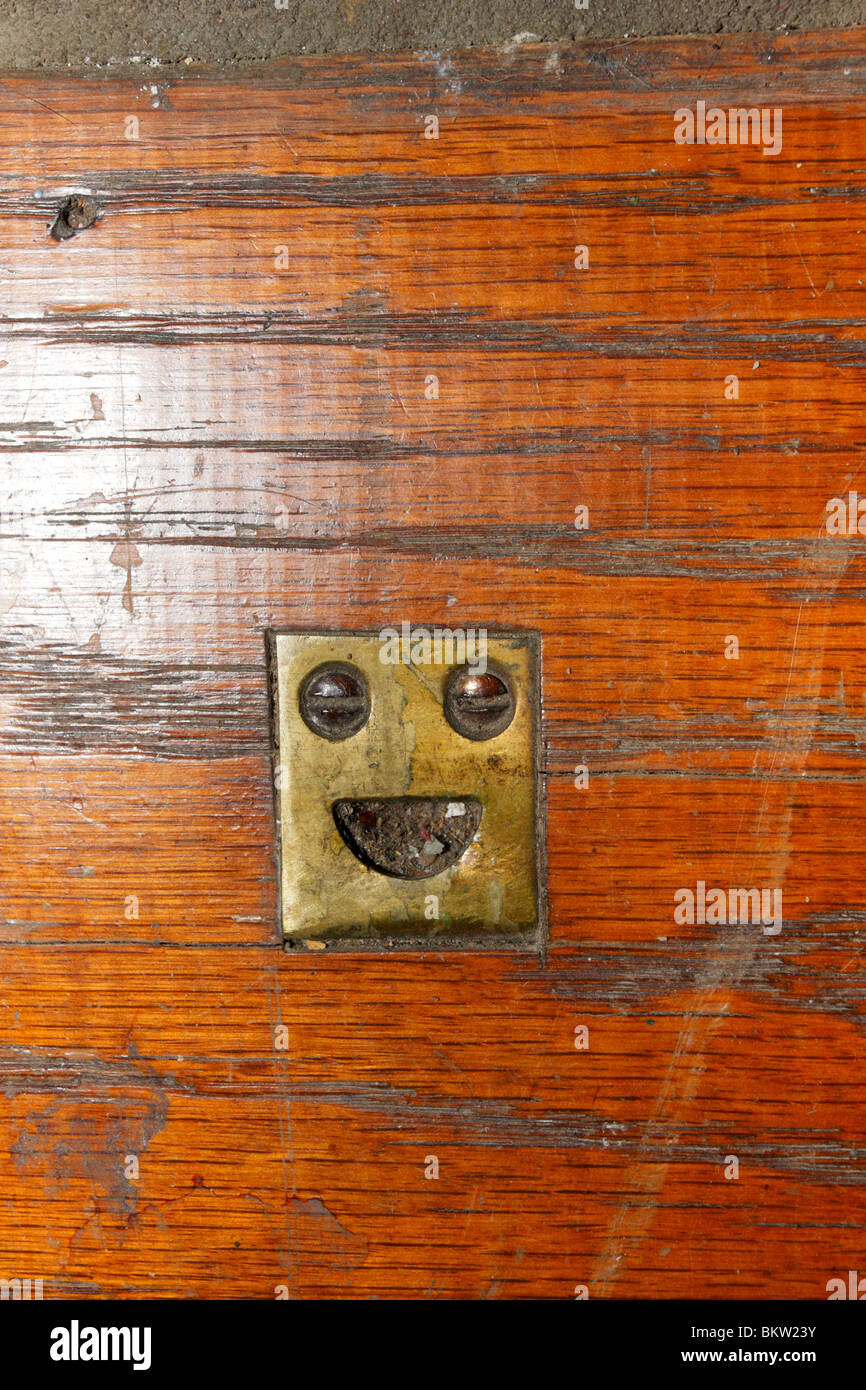 Door latch panel, from floor, brass Stock Photo Alamy