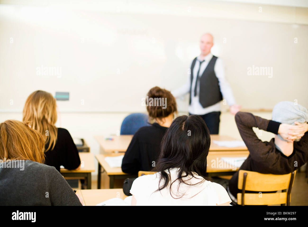 Classroom with students and teacher Stock Photo