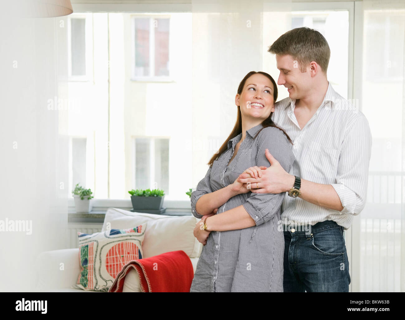 Couple in home hi-res stock photography and images - Alamy
