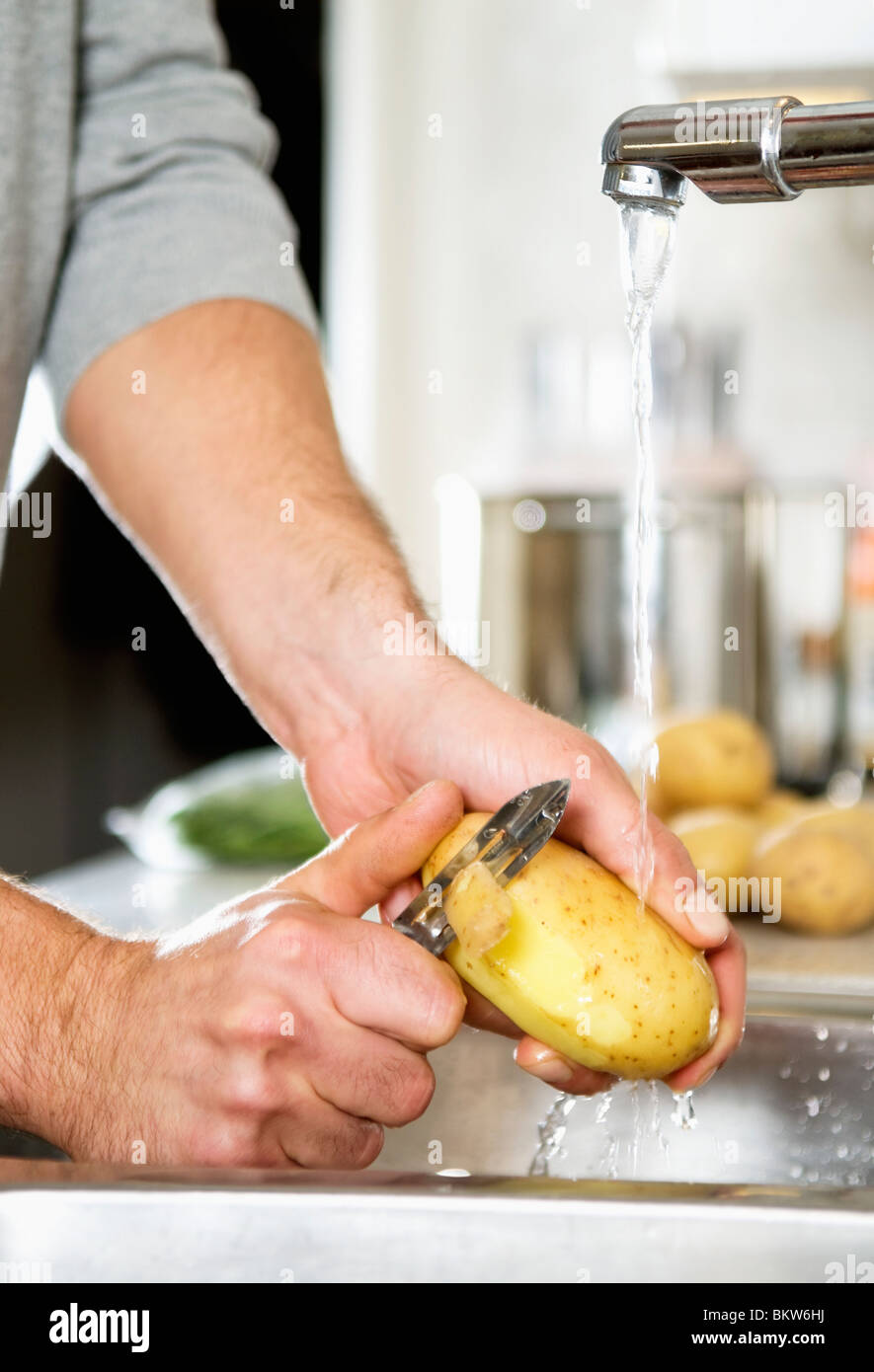 man-peeling-potato-stock-photo-alamy